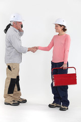 Electrician shaking hands w