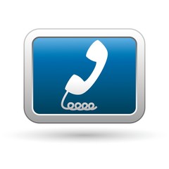 Telephone receiver icon on the blue with silver button