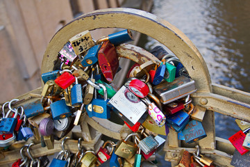 Padlocks on fence in Prague, symbol of love