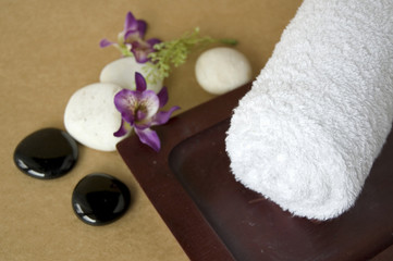 towel on tray with orchid