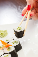 sushi with chopsticks