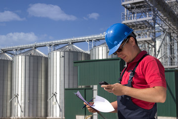 Worker in silo company © cherryandbees
