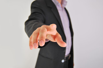 Fototapeta premium Businessman pressing an imaginary button