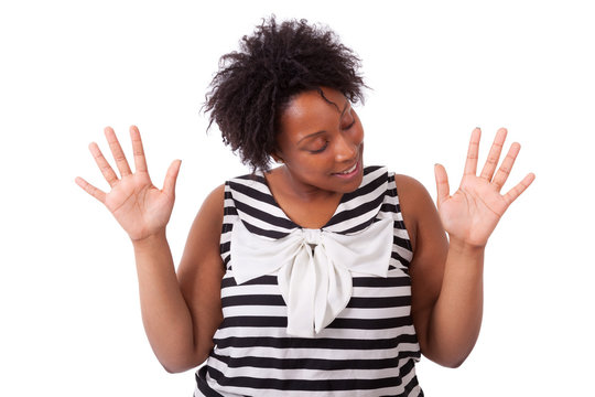 Young black woman showing her  hands palm - African people