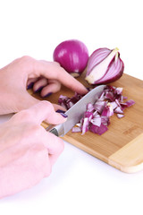 Obraz na płótnie Canvas Cutting purple onion isolated on white