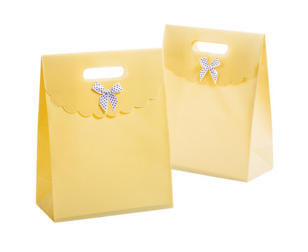 two yellow paper bags isolated