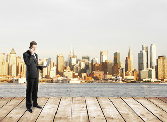 Fototapeta na wymiar businessman standing on pier