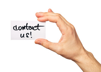 Male hand points on a card Contact Us on a white