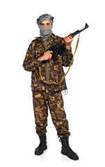 Terrorist with automatic gun on white background