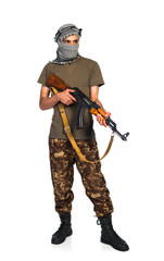 Terrorist with automatic gun on white background