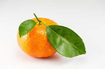 Orange with green leaf