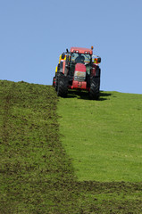 Fototapeta premium Tractor plowing the ground