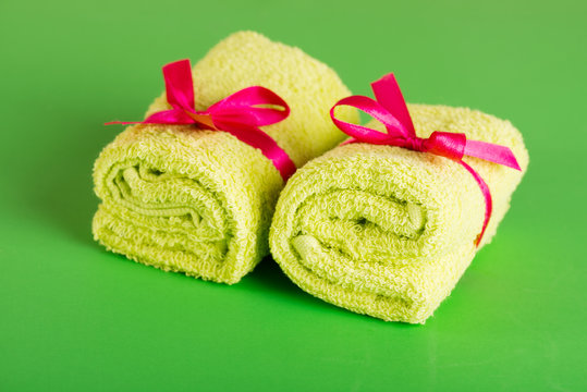 Rolled Up Green Beach Towel