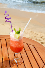 banana daiquiri cocktail with ice on the table