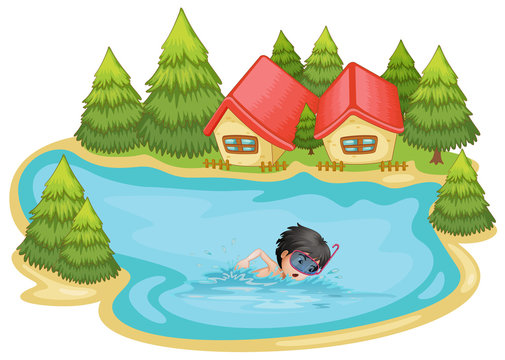A boy swimming in the pool surrounded with pine trees