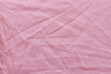 Crumpled pink cloth background