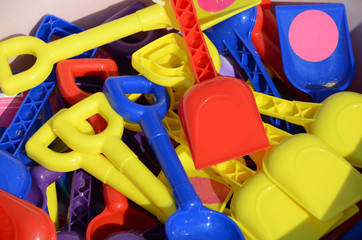 Pile of colourful children's spades