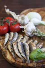 Roasted sardines with organic vegetable