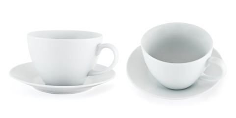 Two empty ceramic tea cup over white plate