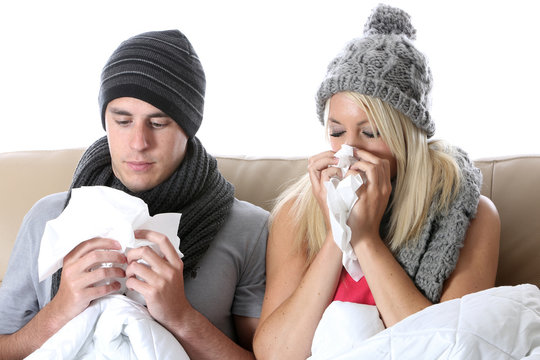 Model Released. Young Couple in Bed Ill