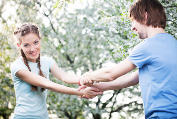 Young attractive couple together outdoors