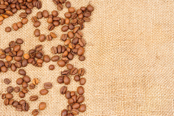 Coffee beans  on burlap background