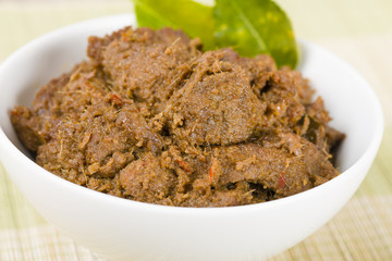 Rendang Daging - Dried beef curry with coconut milk and spices.