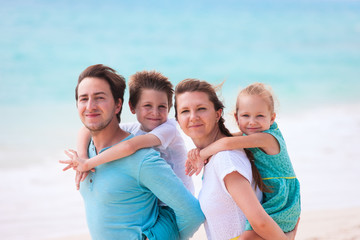 Family on a tropical beach vacation