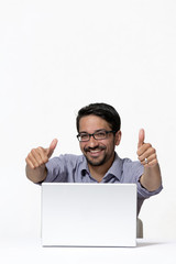 Young asian indian with laptop