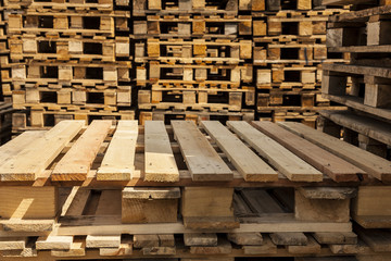 Transport pallets in stacks ready for delivery.