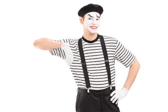 Male mime artist posing