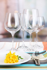 Table setting with glasses for different drinks