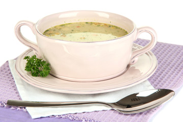 Nourishing soup with vegetables in pan isolated on white