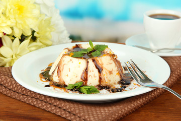 Panna Cotta with chocolate  and caramel sauces,