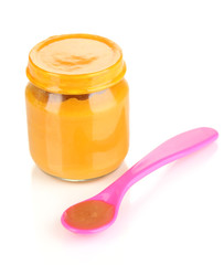 Baby food with weaning spoon isolated on white