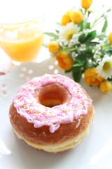 homemade strawberry donut and orange juice
