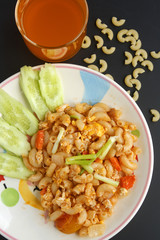 Stir penne pasta with pork and tomato sauce