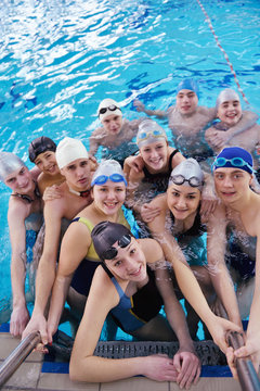 happy teen group  at swimming pool