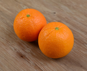 Fresh oranges in wooden