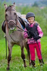 Foto op Canvas Horse and lovely equestrian girl. © Gorilla