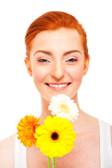 Woman with flowers is smiling