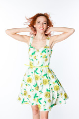 beautiful and young woman on an isolated white background