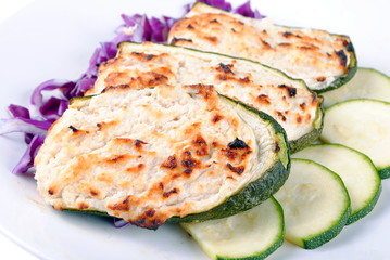stuffed zucchini with tuna and cheese on white
