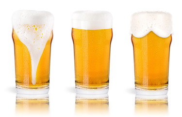 Frosty glass of light beer isolated