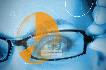 Woman wearing glasses with orange identification technology