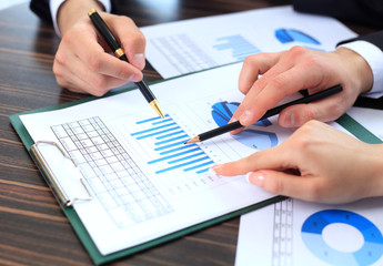 Business people meeting to discuss the situation on the market