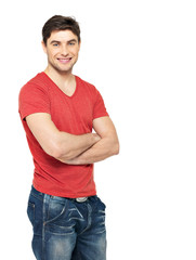 Fototapeta premium smiling handsome man in casuals red t-shirt