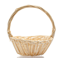 Obraz premium Wattled basket with reflection on a white background