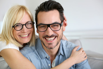 Middle-aged couple wearing eyeglasses
