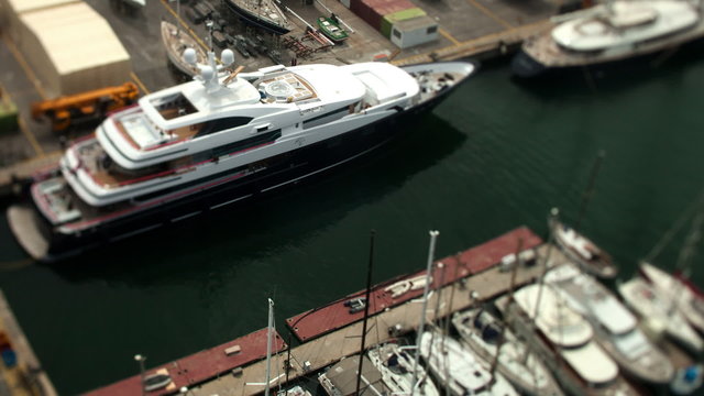 luxury yacht at a commercial harbour